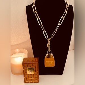 MCM cologne necklace